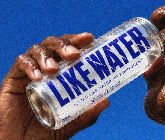 Drinking Like Water from the can against a cobalt sky